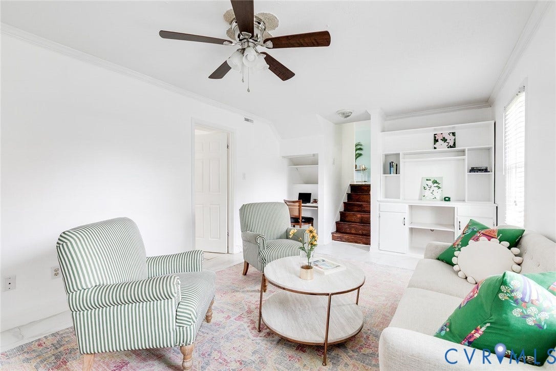 The family room includes built ins for a home office and a library.