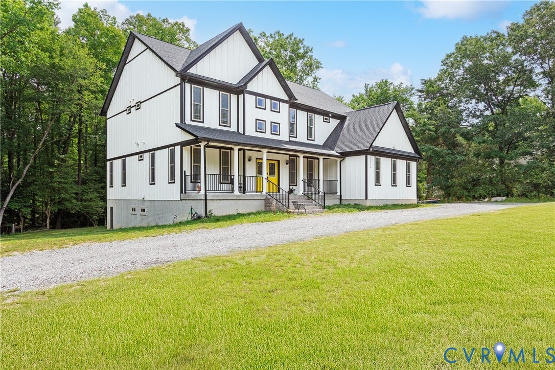 12554 Kain Road, Glen Allen, VA 23059 Two-story exterior with white siding and black trim accents
