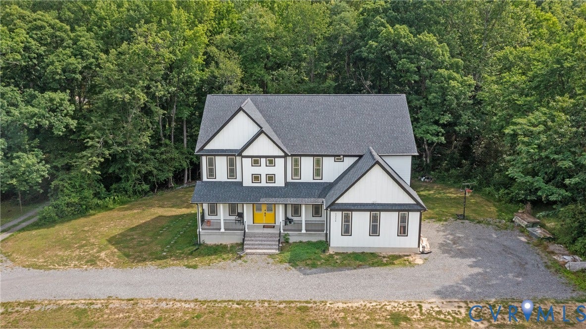 12554 Kain Road, Glen Allen, VA 23059 Contemporary home with a prominent yellow front door, covered porch, and a gravel driveway