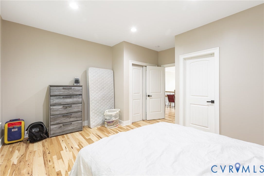 12554 Kain Road, Glen Allen, VA 23059 Wood-finish flooring throughout, complemented by light neutral wall tones and recessed lighting
