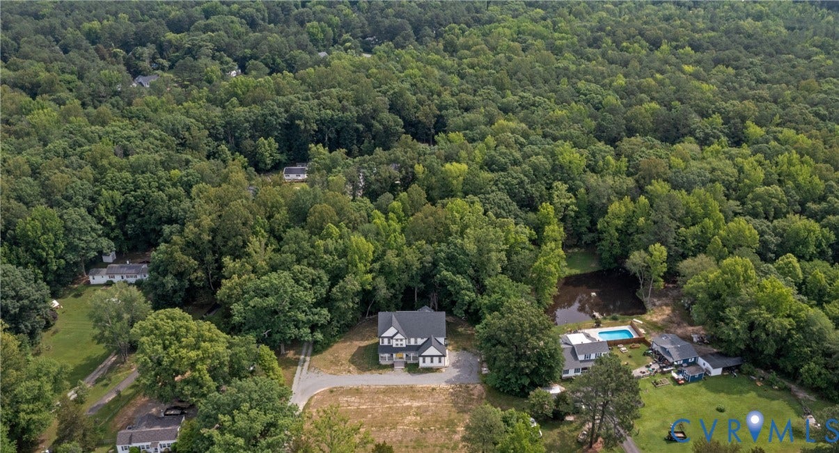 12554 Kain Road, Glen Allen, VA 23059 Aerial view showcasing a substantial residence nestled on expansive grounds surrounded by mature trees and lush landscaping
