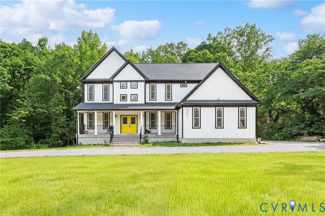 12554 Kain Road, Glen Allen, VA 23059 Striking two-story Colonial with crisp white exterior and black roof accents, featuring a prominent yellow front door, multi-pane windows, and a covered front porch