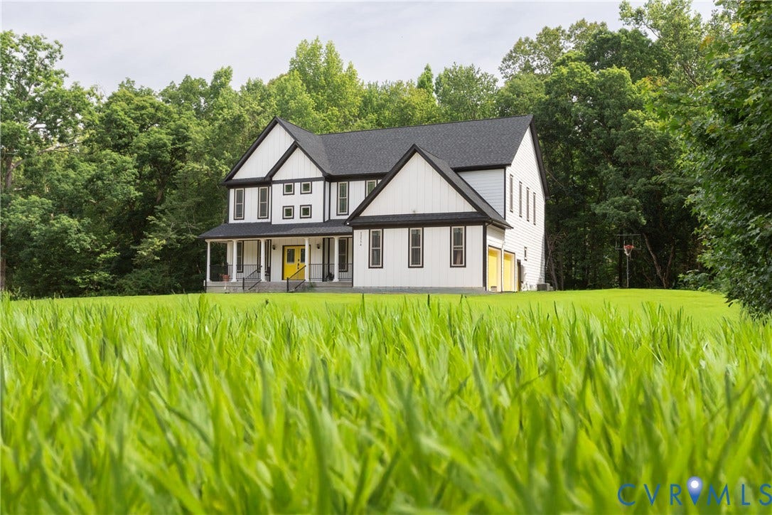 12554 Kain Road, Glen Allen, VA 23059 Two-story exterior with white siding and black trim accents