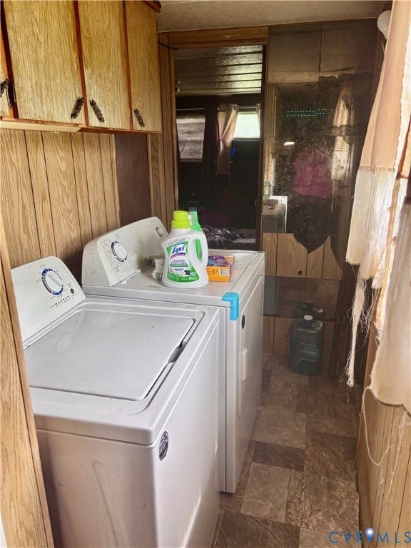 727 Frenchs Store Road, French's Store, Cumberland, VA 23040 Laundry room featuring a white top-load washer with stainless steel appliance trim, wood-finish cabinetry, tile flooring, and ample counter space for folding and sorting