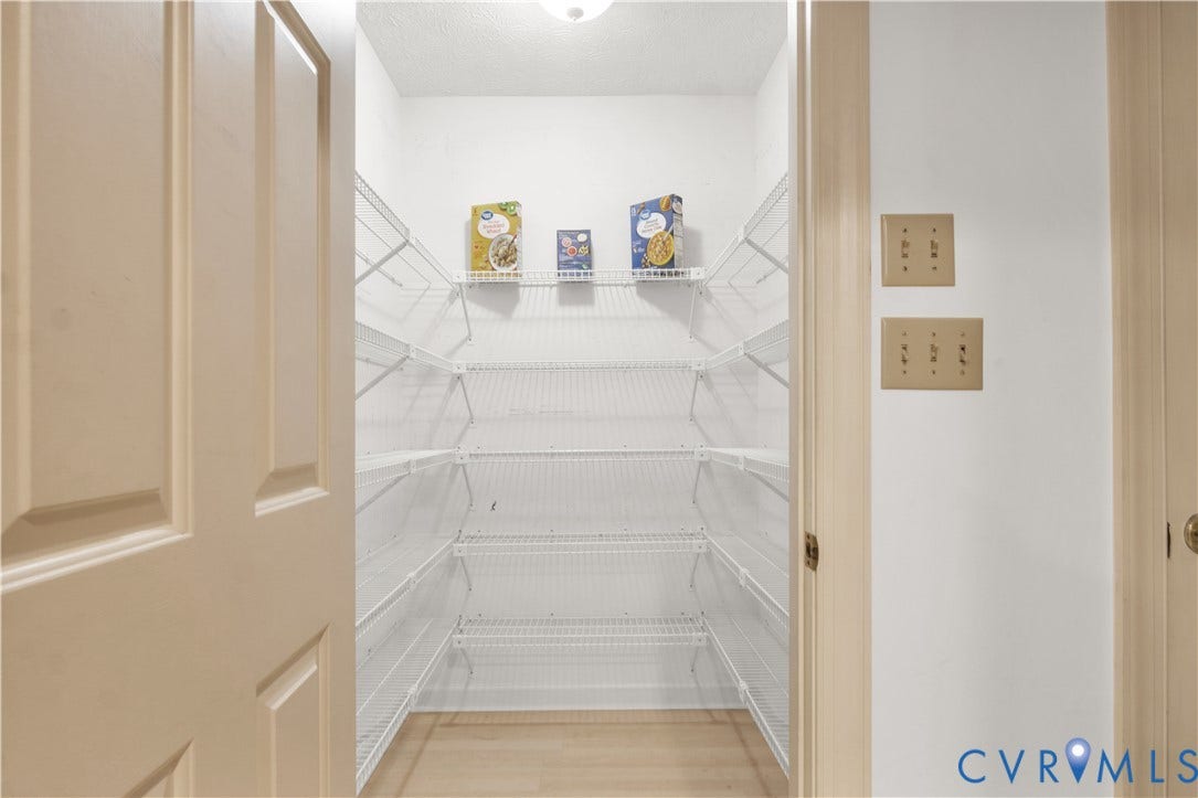 3005 Heritage Landing Road, Heritage Landing, Williamsburg, VA 23185 A generously sized walk-in pantry providing exceptional storage for all your kitchen essentials