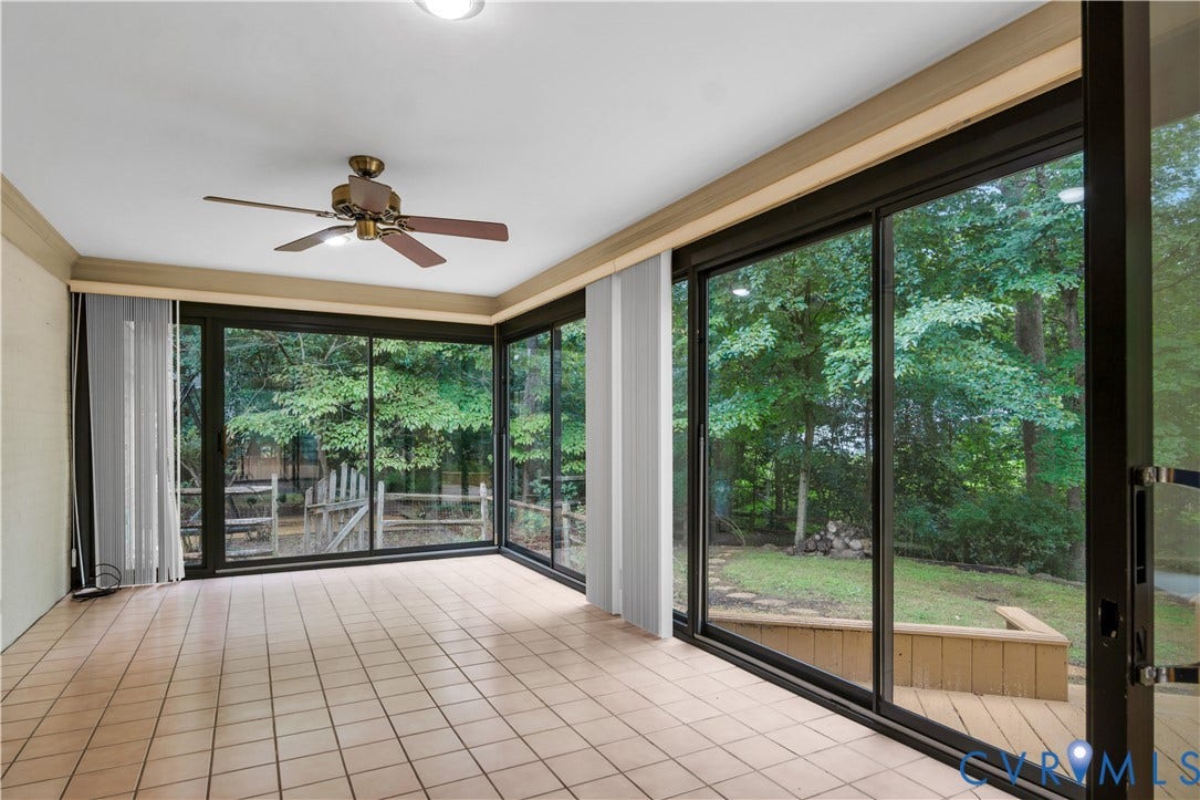 3005 Heritage Landing Road, Heritage Landing, Williamsburg, VA 23185 Sunroom provides sweeping views of natural and wooded landscape