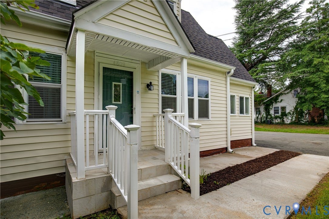 4809 Penick Road, Brookland, Henrico, VA 23228 Welcoming front entry with covered porch featuring white railings and steps