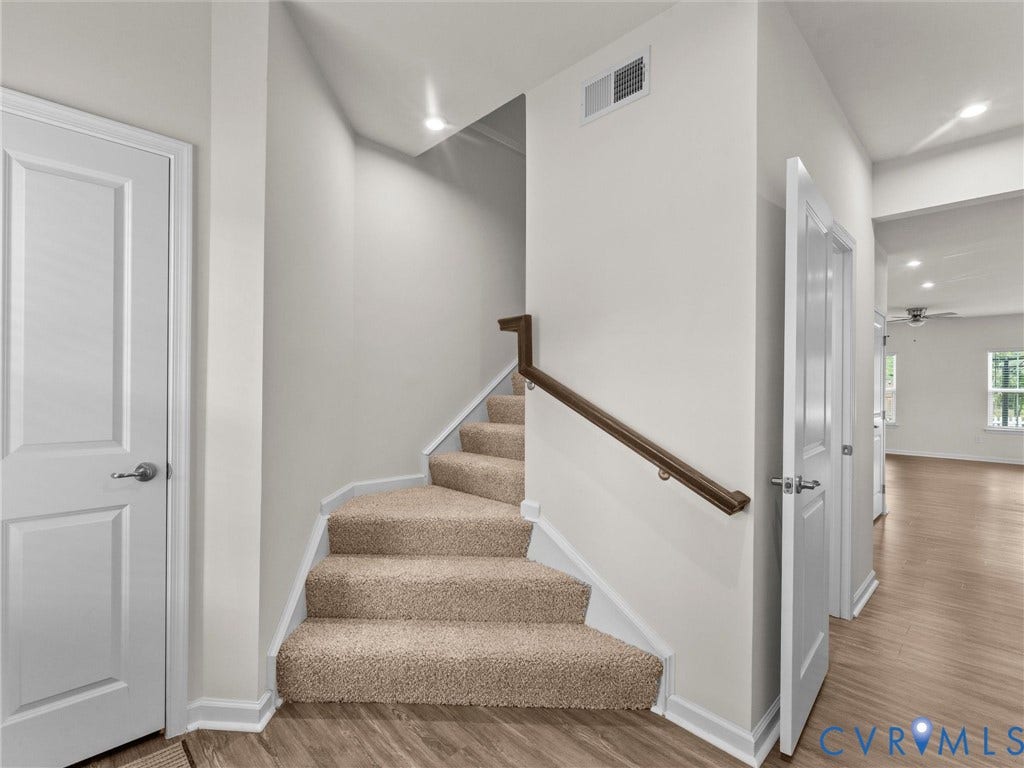 12601 Prestonfield Drive, Blalock, Chesterfield, VA 23836 Carpeted staircase with a wood handrail, recessed lighting, and wood-finish flooring