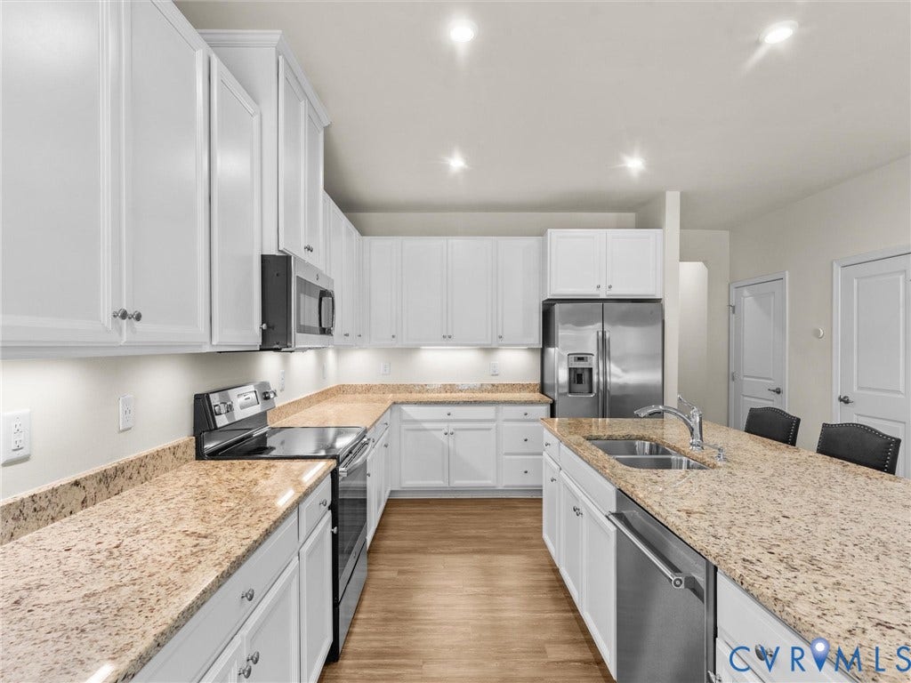 12601 Prestonfield Drive, Blalock, Chesterfield, VA 23836 Kitchen featuring white cabinetry, granite countertops, stainless steel appliances, wood-finish flooring, and recessed lighting