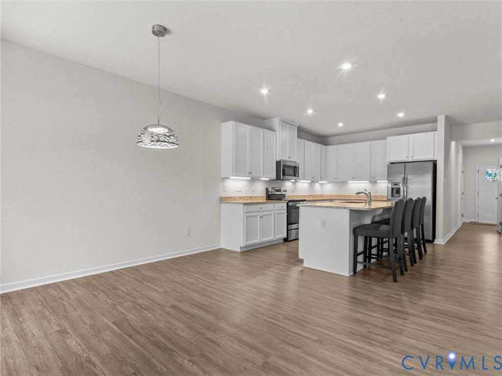 12601 Prestonfield Drive, Blalock, Chesterfield, VA 23836 Open-concept living space featuring wood-finish flooring