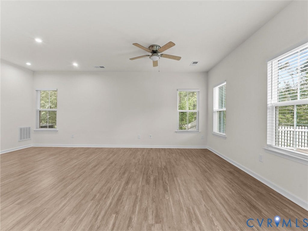 12601 Prestonfield Drive, Blalock, Chesterfield, VA 23836 Wood-finish flooring, recessed lighting, ceiling fan, multiple windows with blinds, and white interior walls