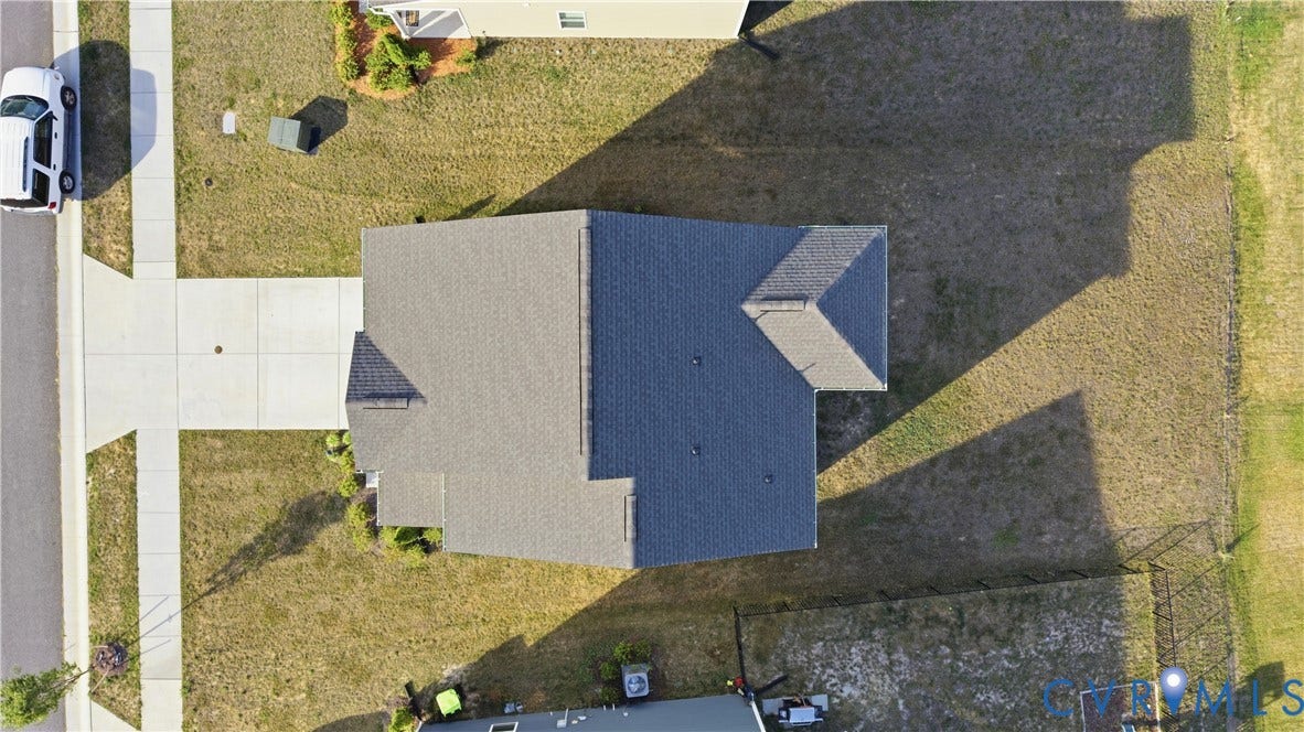 Gable roof architecture featuring dark shingles