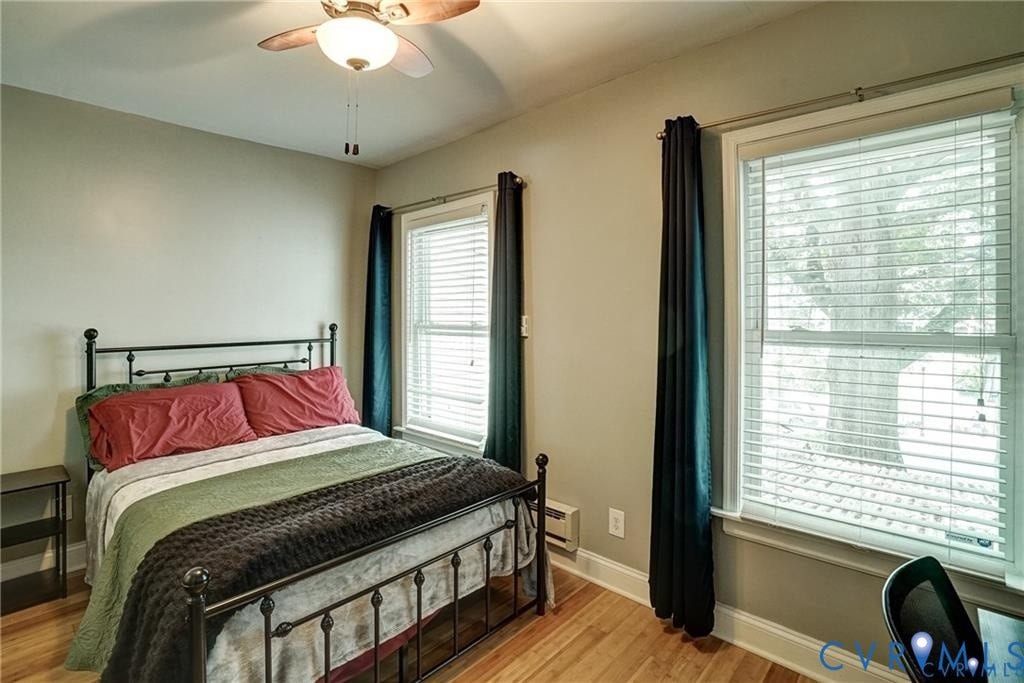 1410 W Clay Street, Richmond, VA 23220 Bedroom with light wood-style flooring and ceiling fan
