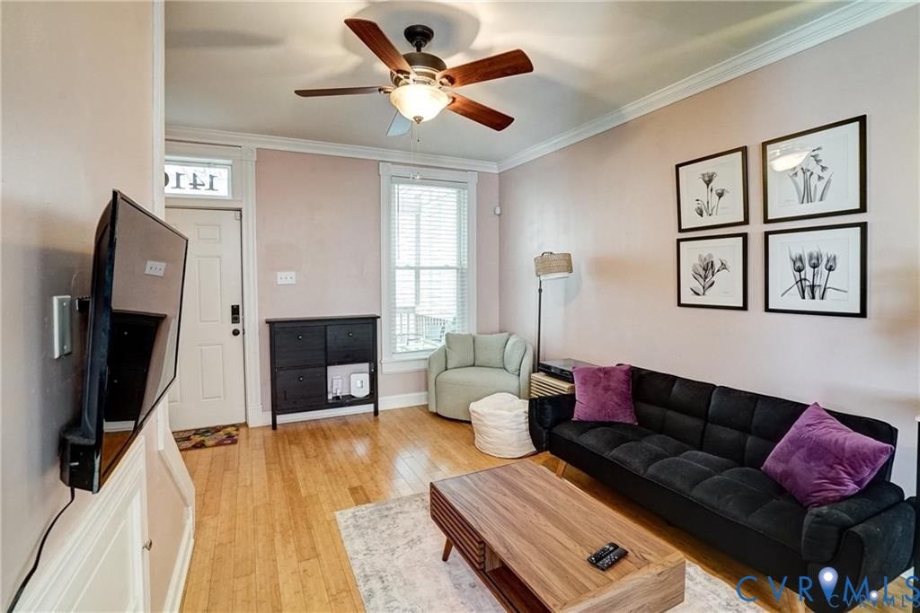 1410 W Clay Street, Richmond, VA 23220 Living area featuring ornamental molding, light wood finished floors, and ceiling fan