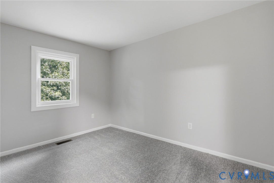3218 Hunters Mill Court, Henrico, VA 23223 Room featuring light grey wall paint, grey patterned carpeting, and white baseboards
