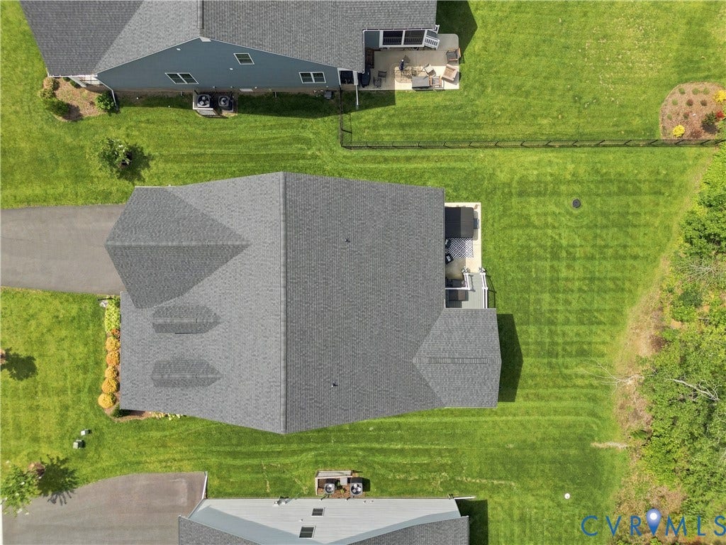 7437 Aldeby Street, Glen Allen, VA 23059 Aerial view showing driveway, home, screened porch, and hot tub