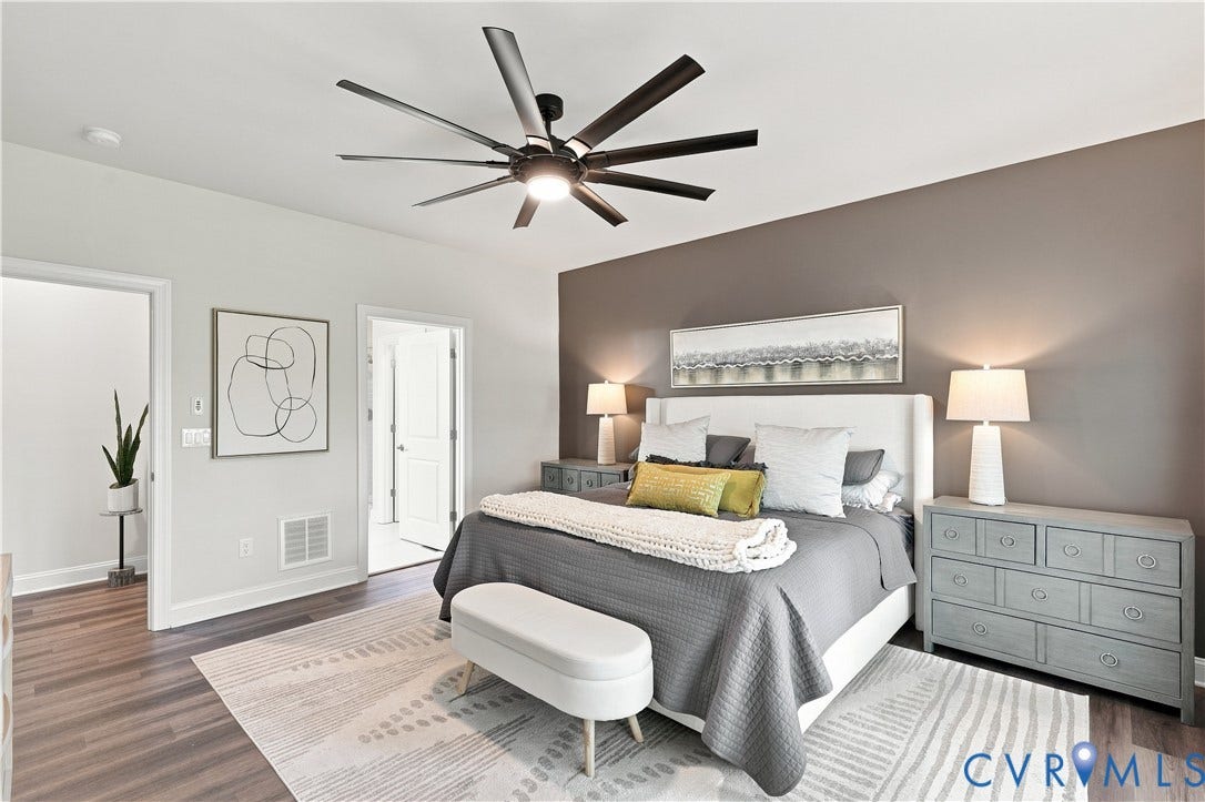 7437 Aldeby Street, Glen Allen, VA 23059 Wood-finish flooring, a contemporary ceiling fan with integrated lighting, and a neutral accent wall