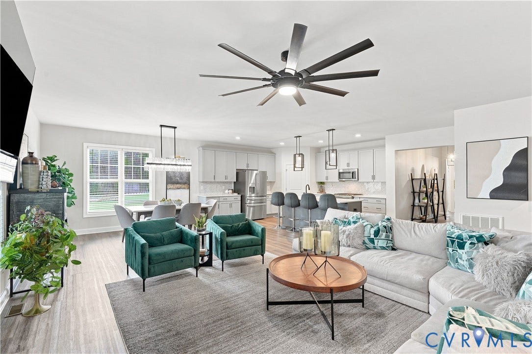 7437 Aldeby Street, Glen Allen, VA 23059 Open-concept living space featuring wood-finish flooring, a large ceiling fan, and recessed lighting