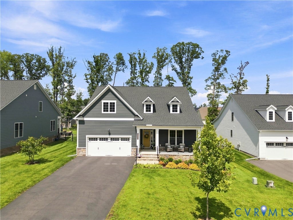 7437 Aldeby Street, Glen Allen, VA 23059 Siding exterior with stone accents, covered front porch, and dormer windows