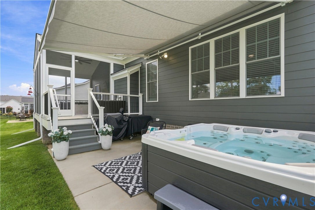 7437 Aldeby Street, Glen Allen, VA 23059 Covered patio with a spa / hot tub, screened-in porch, and exterior siding