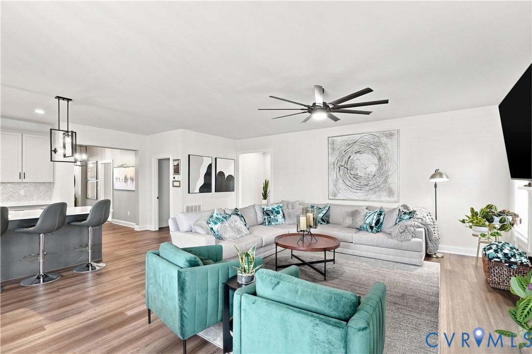 7437 Aldeby Street, Glen Allen, VA 23059 Open-concept living space featuring wood-finish flooring, a modern ceiling fan, and recessed lighting