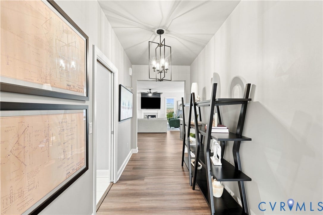 7437 Aldeby Street, Glen Allen, VA 23059 Wood-finish flooring throughout, paired with light-colored walls