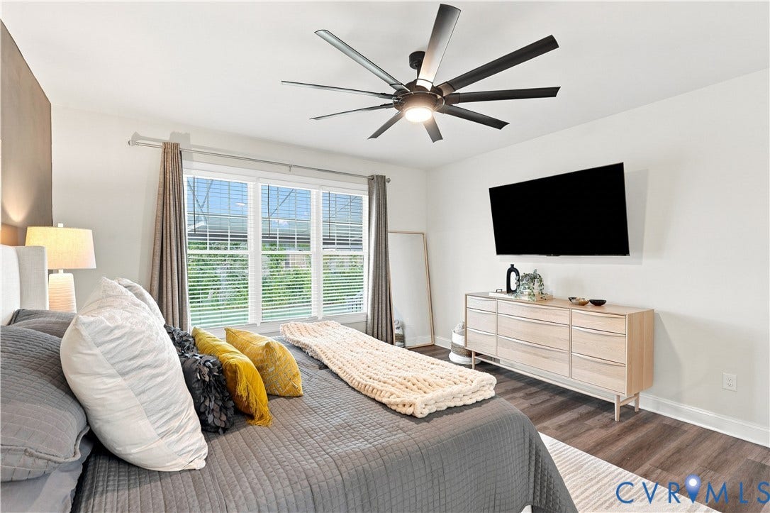 7437 Aldeby Street, Glen Allen, VA 23059 Wood-finish flooring with a light area rug
