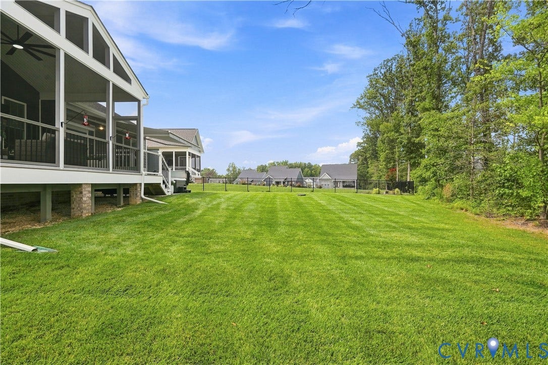 7437 Aldeby Street, Glen Allen, VA 23059 Expansive green lawn with a screened-in porch and an additional covered porch