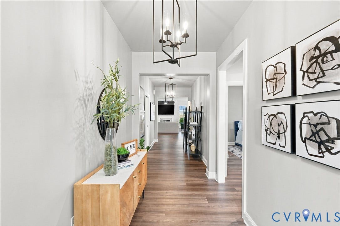 7437 Aldeby Street, Glen Allen, VA 23059 Long hallway featuring wood-finish flooring, recessed lighting, and modern ceiling-mounted light fixtures