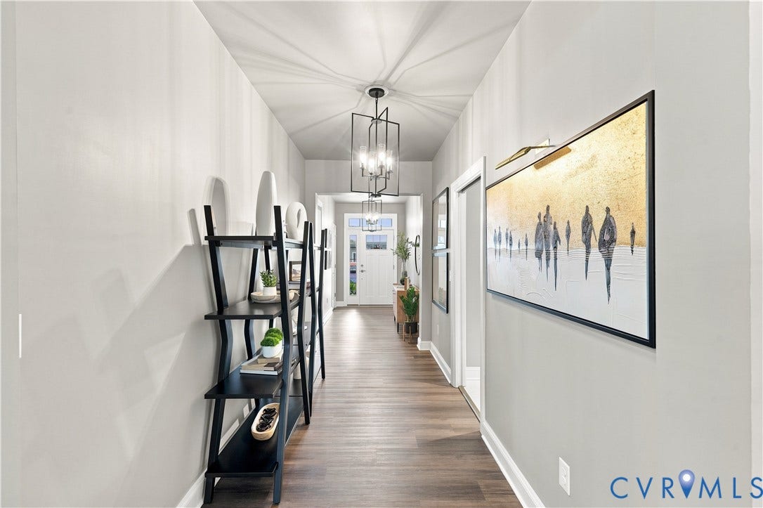 7437 Aldeby Street, Glen Allen, VA 23059 Hallway with wood-finish flooring, recessed lighting, and a modern chandelier