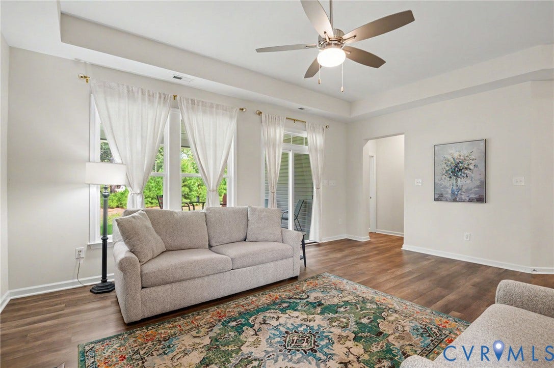 11618 Orchard Falls Circle, Chickahominy Falls, Glen Allen, VA 23059 Tray ceiling with a ceiling fan light fixture, wood-finish flooring, and a sliding glass door