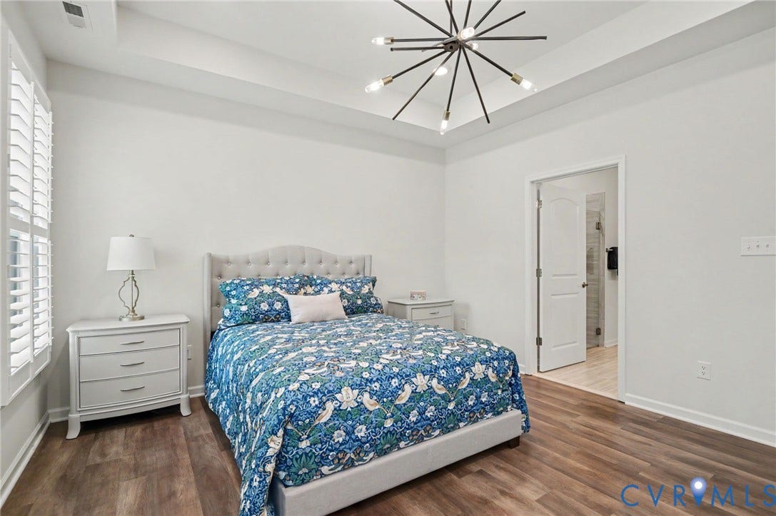 11618 Orchard Falls Circle, Chickahominy Falls, Glen Allen, VA 23059 Tray ceiling with a modern sputnik chandelier