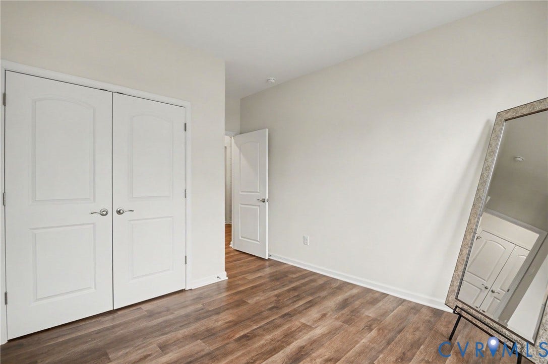 11618 Orchard Falls Circle, Chickahominy Falls, Glen Allen, VA 23059 Wood-finish flooring with white walls and trim
