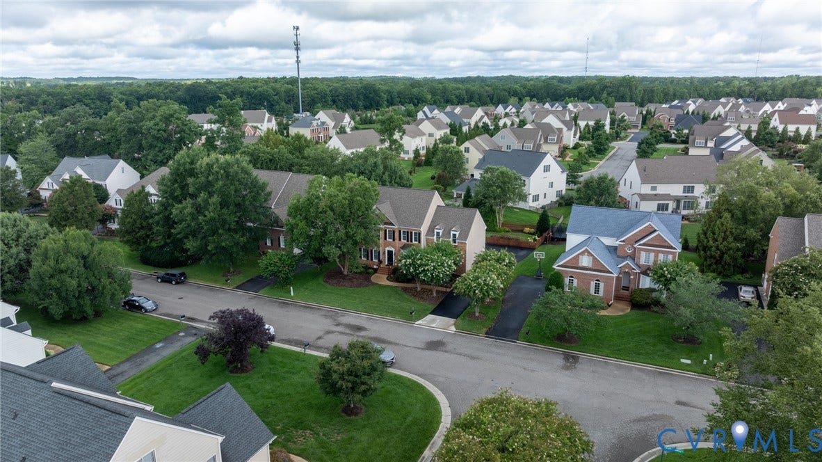 12320 Bradford Landing Way, Glen Allen, VA 23059 Residential street featuring a collection of traditional-style homes with varied architectural details and well-maintained front yards