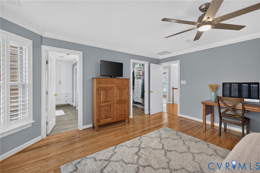 12320 Bradford Landing Way, Glen Allen, VA 23059 Hardwood-finish flooring featuring a ceiling fan with integrated lighting, crown molding, and plantation shutters