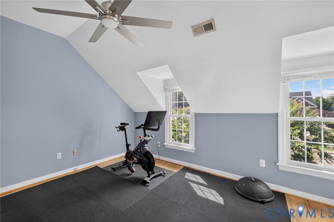 12320 Bradford Landing Way, Glen Allen, VA 23059 Versatile attic space featuring sloped ceilings, a ceiling fan, and light wood-finish flooring
