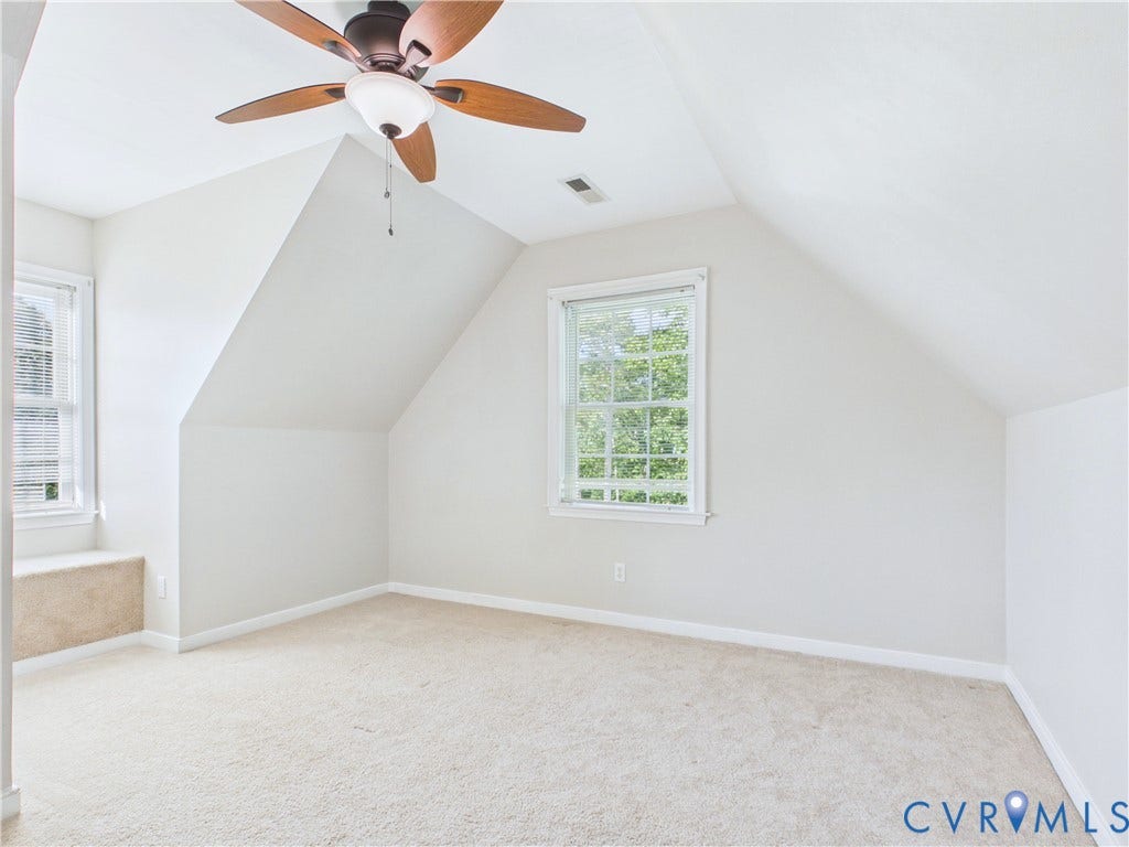 4515 Exton Lane, Chester, VA 23831 Vaulted ceiling with a ceiling fan, light-toned carpeting, and a window with blinds