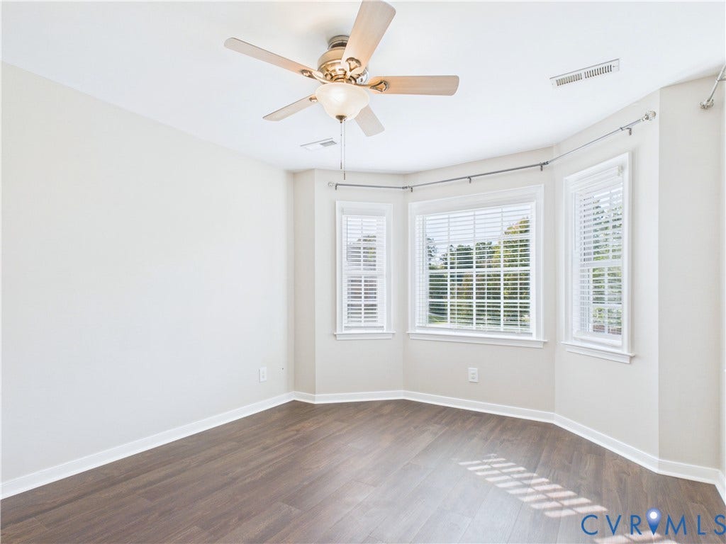 4515 Exton Lane, Chester, VA 23831 Wood-finish flooring, bay window with multiple panes, ceiling fan with integrated lighting