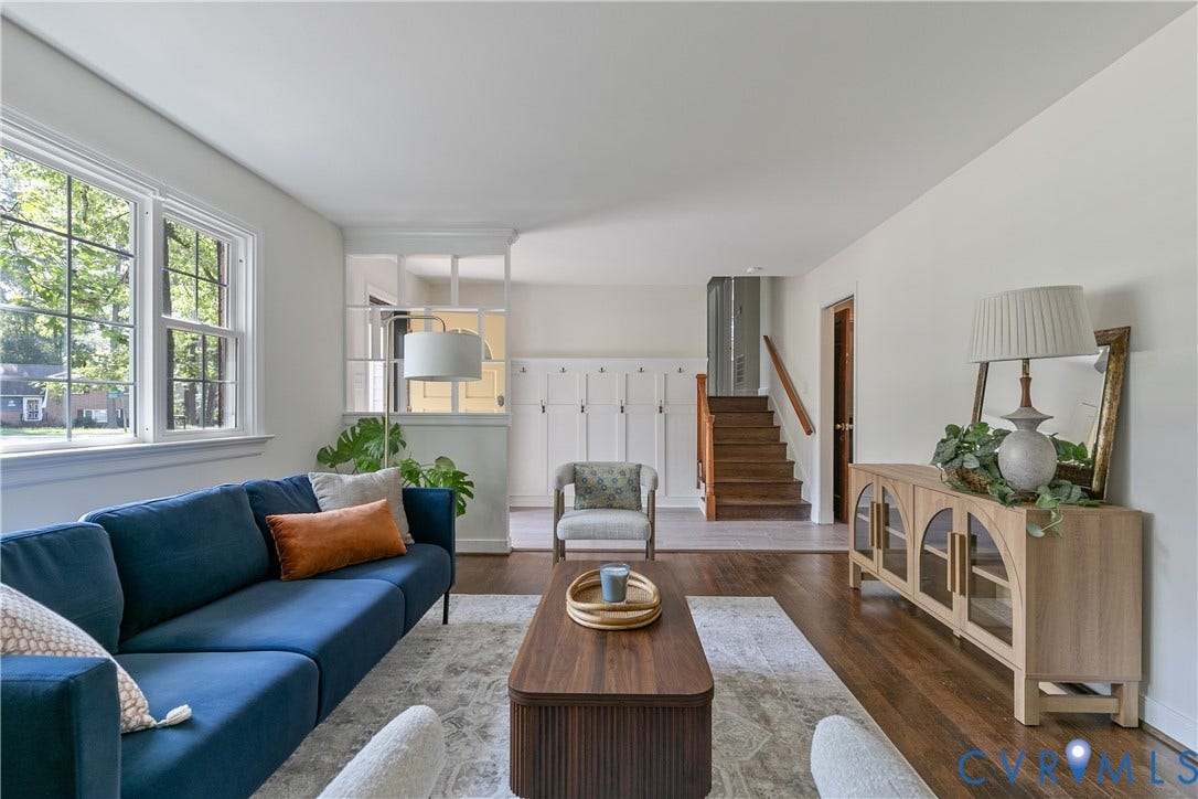 200 Stanmore Road, North Chesterfield, VA 23236 Hardwood flooring, white walls, double-hung windows, built-in storage cabinets, and a wooden staircase with railing