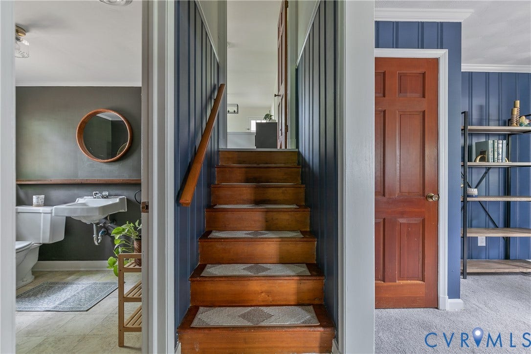 200 Stanmore Road, North Chesterfield, VA 23236 Wood-finish staircase with carpeted treads, leading to an upper level