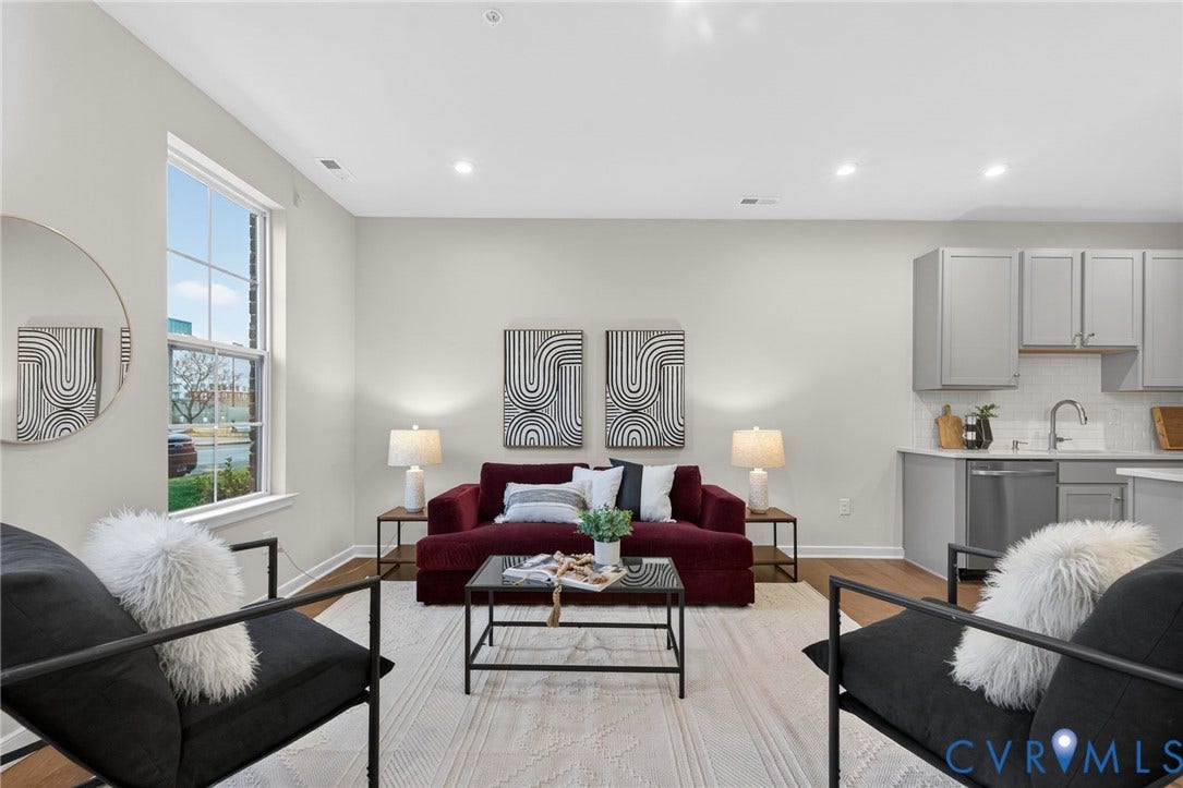 2439 Ownby Lane, #B 13, Richmond, VA 23220 Open-concept living space featuring wood-finish flooring, recessed lighting, a kitchen with light gray cabinetry, and a subway tile backsplash