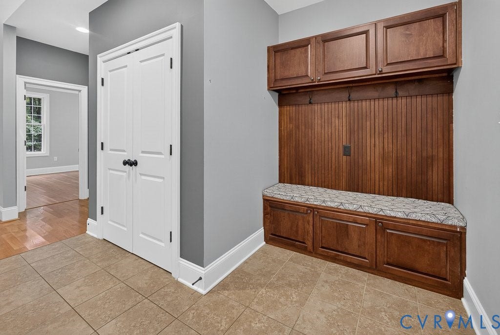 8825 First Branch Lane, Chesterfield, VA 23838 Built-in wood mudroom storage with upper cabinetry and beadboard backing