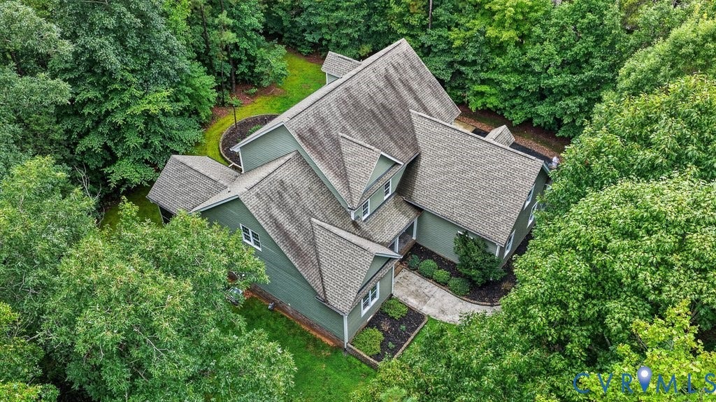 8825 First Branch Lane, Chesterfield, VA 23838 Multi-level roofline with dormer windows, surrounded by mature trees