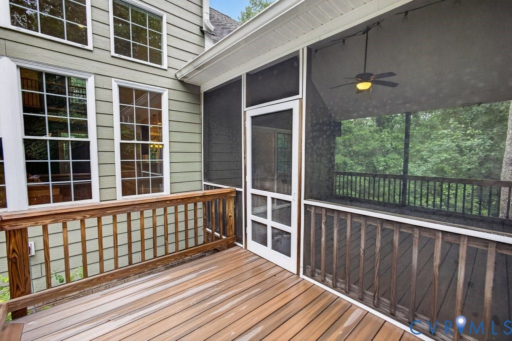 8825 First Branch Lane, Chesterfield, VA 23838 Wood deck with wood railing, screened porch, ceiling fan, and horizontal siding