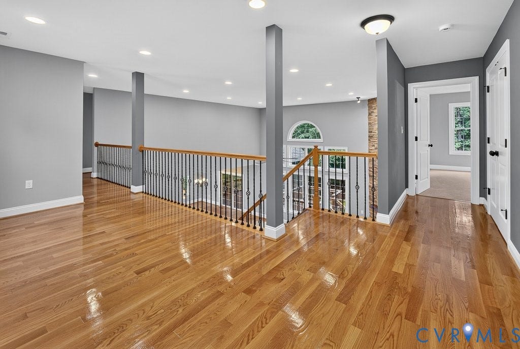 8825 First Branch Lane, Chesterfield, VA 23838 Hardwood flooring, recessed ceiling lighting, wrought iron balusters, arched window, and paneled interior doors