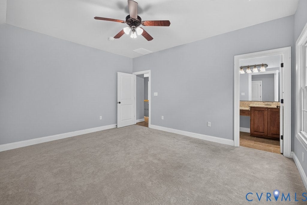 8825 First Branch Lane, Chesterfield, VA 23838 Carpeted room with a ceiling fan and light fixture, featuring light gray walls and white trim