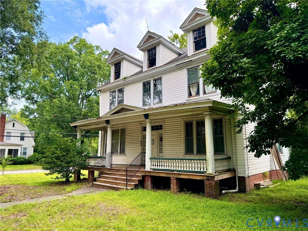 3521 Montrose Avenue, Ginter Park, Richmond, VA 23222 Three-story residence featuring white siding and a covered porch with round columns