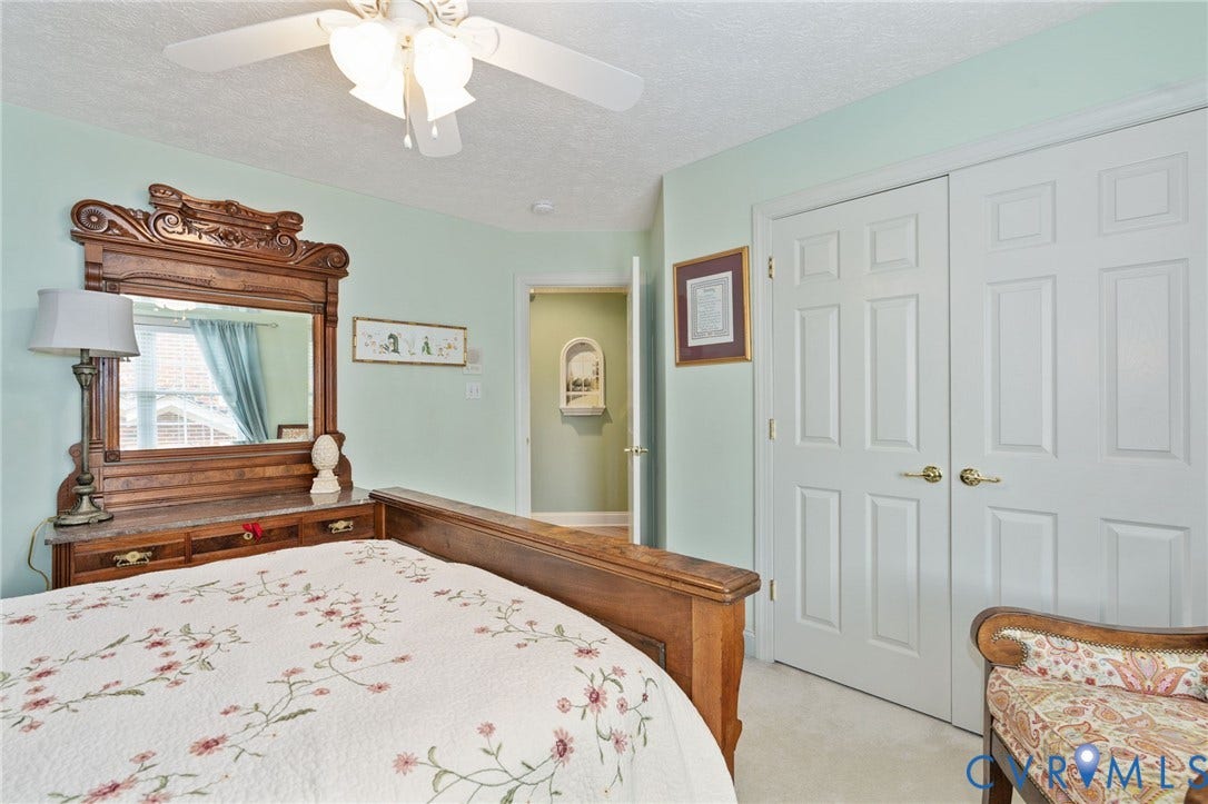 Wall-to-wall carpeting in a light tone