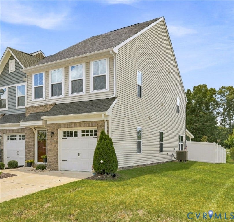 10877 Genito Square Drive, Midlothian, VA 23112 Open space, side yard cared for by the HOA, fenced backyard.