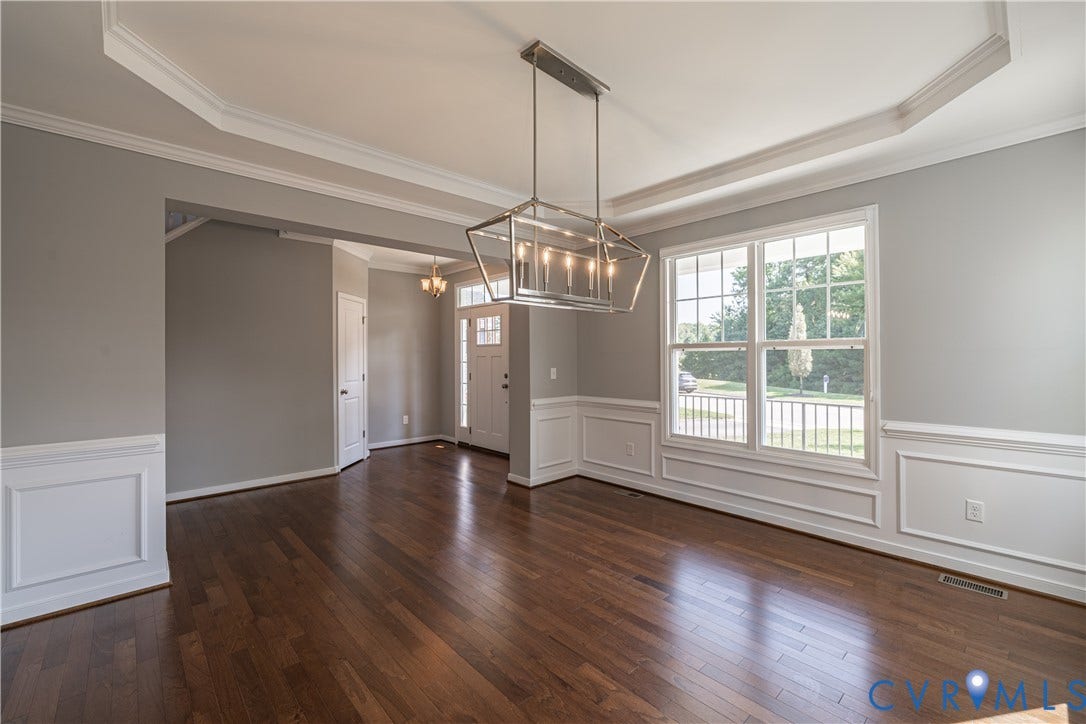 Dining Room with chair rail/ picture frame molding, tray ceiling